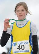 16 February 2011; Siofra Cleirigh Buttner, Colaiste Iosagain, with her first place medal following the Intermediate Girls event at the Aviva Leinster Schools Cross Country. Santry Demesne, Santry, Dublin. Picture credit: Stephen McCarthy / SPORTSFILE