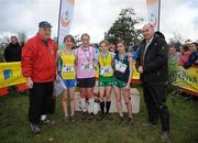 16 February 2011; Podium finishers, from left, Roisin Ni Uileagoid, Colaiste Iosagain, fourth place, Sarah Hawkshaw, Mount Sackville, third place, Siofra Cleirigh Buttner, Colaiste Iosagain, first place, and Linda Conroy, Mercy Kilbeggan, second place, with Jim Dowdall, CEO of Aviva Ireland, and Fr. Ailibe O'Murchu OFM, President of the Leinster Schools' Athletics Union, following the Intermediate Girls event at the Aviva Leinster Schools Cross Country. Santry Demesne, Santry, Dublin. Picture credit: Stephen McCarthy / SPORTSFILE