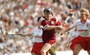 22 September 1996; Imelda Hobbins, Galway, in action against Sandie Fitzgibbon, left, and Therese O'Callaghan, Cork. All-Ireland Senior Camogie Championship Final, Cork v Galway, Croke Park, Dublin. Picture credit: Ray McManus / SPORTSFILE