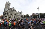 30 October 2016; Runners pass Dublinia Museum and Christchurch Cathedral during the SSE Airtricity Dublin Marathon 2016 in Dublin City. 19,500 runners took to the Fitzwilliam Square start line to participate in the 37th running of the SSE Airtricity Dublin Marathon, making it the fourth largest marathon in Europe. Photo by Ramsey Cardy/Sportsfile