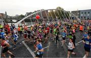 30 October 2016; Runners pass James Joyce bridge during the SSE Airtricity Dublin Marathon 2016 in Dublin City. 19,500 runners took to the Fitzwilliam Square start line to participate in the 37th running of the SSE Airtricity Dublin Marathon, making it the fourth largest marathon in Europe. Photo by Seb Daly/Sportsfile