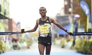 30 October 2016; Dereje Debele Tulu from Ethiopia crosses the line to win the SSE Airtricity Dublin Marathon 2016 at Merrion Square in Dublin City. 19,500 runners took to the Fitzwilliam Square start line to participate in the 37th running of the SSE Airtricity Dublin Marathon, making it the fourth largest marathon in Europe. Photo by Stephen McCarthy/Sportsfile