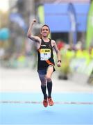 30 October 2016; David Mansfield, from Co Tipperary, celebrates completing the SSE Airtricity Dublin Marathon 2016 at Merrion Square in Dublin City. 19,500 runners took to the Fitzwilliam Square start line to participate in the 37th running of the SSE Airtricity Dublin Marathon, making it the fourth largest marathon in Europe. Photo by Stephen McCarthy/Sportsfile