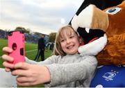 29 October 2016; A young Leinster supporter has her photograph taken with Leo The Lion ahead of the Guinness PRO12 Round 7 match between Leinster and Connacht at the RDS Arena, Ballsbridge, in Dublin. Photo by Stephen McCarthy/Sportsfile