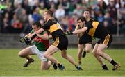 30 October 2016; Peter O'Dwyer of Kilmurry Ibrickane in action against Fionn Fitzgerald and Michael Moloney of Dr Crokes during the AIB Munster GAA Football Senior Club Championship quarter-final game between Kilmurry Ibrickane and Dr. Crokes in Quilty, Co. Clare. Photo by Diarmuid Greene/Sportsfile