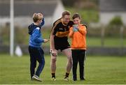 30 October 2016; Jimmy Gallagher, aged 11, right, and Rory Lillis, aged 10, from Cooraclare, Co. Clare, take selfies with Colm Cooper of Dr Crokes after the  the AIB Munster GAA Football Senior Club Championship quarter-final game between Kilmurry Ibrickane and Dr. Crokes in Quilty, Co. Clare. Photo by Diarmuid Greene/Sportsfile