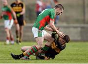 30 October 2016; Shane Hickey of Kilmurry Ibrickane clashes with Jordan Kelly of Dr. Crokes during the AIB Munster GAA Football Senior Club Championship quarter-final game between Kilmurry Ibrickane and Dr. Crokes in Quilty, Co. Clare. Photo by Diarmuid Greene/Sportsfile