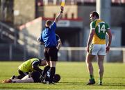 30 October 2016; Michael Murphy of Glenswilly receives a first half yellow card from Referee Barry Cassidy after an incident during the AIB Ulster GAA Football Senior Club Championship quarter-final game between Kilcoo and Glenswilly at Pairc Esler, Newry, Co. Down. Photo by Oliver McVeigh/Sportsfile
