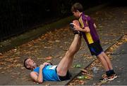 30 October 2016; Danny Costello, age 10, with Declan Costello, both from Ramsgrange, Co Wexford, after competing in the SSE Airtricity Dublin Marathon 2016 at Merrion Square in Dublin City. 19,500 runners took to the Fitzwilliam Square start line to participate in the 37th running of the SSE Airtricity Dublin Marathon, making it the fourth largest marathon in Europe. Photo by Stephen McCarthy/Sportsfile