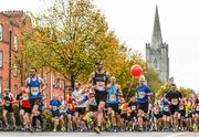 30 October 2016; Runners pass St Patricks Cathedral during the SSE Airtricity Dublin Marathon 2016 in Dublin. 19,500 runners took to the Fitzwilliam Square start line to participate in the 37th running of the SSE Airtricity Dublin Marathon, making it the fourth largest marathon in Europe. Photo by Ramsey Cardy/Sportsfile