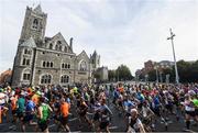 30 October 2016; Runners pass Dublinia Museum and Christchurch Cathedral during the SSE Airtricity Dublin Marathon 2016 in Dublin City. 19,500 runners took to the Fitzwilliam Square start line to participate in the 37th running of the SSE Airtricity Dublin Marathon, making it the fourth largest marathon in Europe. Photo by Ramsey Cardy/Sportsfile