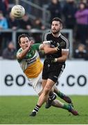 30 October 2016; Felim McGreevy of Kilcoo in action against Michael Murphy of Glenswilly during the AIB Ulster GAA Football Senior Club Championship quarter-final game between Kilcoo and Glenswilly at Pairc Esler, Newry, Co. Down. Photo by Oliver McVeigh/Sportsfile