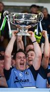 30 October 2016; Joe Lyons of Simonstown Gaels lifts the trophy following his team's victory in the Meath County Senior Club Football Championship Final game between Donaghmore/Ashbourne and Simonstown at Pairc Táilteann in Navan, Co. Meath. Photo by Seb Daly/Sportsfile