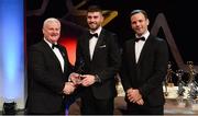 3 November 2017; Kildare hurler Paul Divilly is presented with his Christy Ring Champion 15 award by Uachtarán Chumann Lúthchleas Gael Aogán Ó Fearghail, left, and David Collins, GPA President, during the PwC All Stars 2017 at the Convention Centre in Dublin. Photo by Piaras Ó Mídheach/Sportsfile