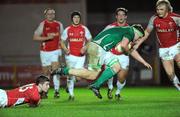 11 March 2011; Jordi Murphy, Ireland, goes past the tackle of Steve Shingler, Wales. U20 Six Nations Rugby Championship, Wales v Ireland, Parc y Scarlets, Llanelli, Carmarthenshire, Wales. Picture credit: Matt Browne / SPORTSFILE