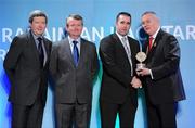 16 March 2011; David Earley is presented with the GAA President's Family Award for 2011 by Uachtarán Cumann Lúthchleas Gael Criostóir Ó Cuana, right, in the company of AIB Bank General Manager Billy Finn, left, and Pól Ó Gallchóir, Ceannaái TG4. David's father Dermot Earley passed away aged 62 in June of 2010. Dermot was the former Chief of Staff of the Irish Defence Forces and starred for Roscommon for 20 years. He won two GAA All Stars in a distinguished career. His wife, Mary, and six children, including his son, Dermot, a GAA All Star winner with Kildare, received the family award. GAA President's Awards 2011, Croke Park, Dublin. Picture credit: Brian Lawless / SPORTSFILE