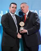 16 March 2011; David Earley is presented with the GAA President's Family Award for 2011 by Uachtarán Cumann Lúthchleas Gael Criostóir Ó Cuana. David's father Dermot Earley passed away aged 62 in June of 2010. Dermot was the former Chief of Staff of the Irish Defence Forces and starred for Roscommon for 20 years. He won two GAA All Stars in a distinguished career. His wife, Mary, and six children, including his son, Dermot, a GAA All Star winner with Kildare, received the family award. GAA President's Awards 2011, Croke Park, Dublin. Picture credit: Brian Lawless / SPORTSFILE