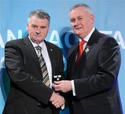 16 March 2011; John Joe Brady, Mullahoran, Co. Cavan, is presented with his GAA President's Award for 2011 by Uachtarán Cumann Lúthchleas Gael Criostóir Ó Cuana. John Joe Brady’s association with Ladies Football goes back to 1976 and he has held practically all the positions of administration and management of football teams. John Joe was the first Chairman of the Mullahoran Club in the years 1975 and 1982 and from 1995 to ‘99. He helped bring the Mullahoran Ladies to the top of the ladder in 1977 when they won the first ever All-Ireland Club final. GAA President's Awards 2011, Croke Park, Dublin. Picture credit: Brian Lawless / SPORTSFILE
