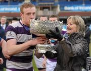17 March 2011; Clongowes Wood College SJ captain Conor Gilsenan receives the cup from his mother Joan. Powerade Leinster Schools Senior Cup Final, Cistercian College Roscrea v Clongowes Wood College SJ, RDS, Ballsbridge, Dublin. Picture credit: Stephen McCarthy / SPORTSFILE
