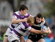 17 March 2011; Shane Layden, Cistercian College Roscrea, is tackled by Conor Joyce, left, and Sebastien Fromm, Clongowes Wood College SJ. Powerade Leinster Schools Senior Cup Final, Cistercian College Roscrea v Clongowes Wood College SJ, RDS, Ballsbridge, Dublin. Picture credit: Stephen McCarthy / SPORTSFILE