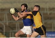30 October 2016; Stefan Forker of Maghery Seán MacDiarmada in action against Eóin Sommerville of Ramor United during the AIB Ulster GAA Football Senior Club Championship quarter-final game between Maghery Seán MacDiarmada and Ramor United at Athletic Grounds in Armagh. Photo by Philip Fitzpatrick/Sportsfile