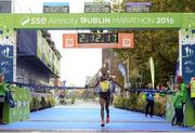 30 October 2016; Dereje Debele Tulu from Ethiopia crosses the line to win the men's race during the SSE Airtricity Dublin Marathon 2016 at Merrion Square in Dublin City. 19,500 runners took to the Fitzwilliam Square start line to participate in the 37th running of the SSE Airtricity Dublin Marathon, making it the fourth largest marathon in Europe. Photo by Cody Glenn/Sportsfile
