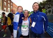 30 October 2016; Aoife and Shane Loughran, with their 5-year-old daughter Emily, from Dunleer, Co. Louth, following the SSE Airtricity Dublin Marathon 2016 in Dublin City. 19,500 runners took to the Fitzwilliam Square start line to participate in the 37th running of the SSE Airtricity Dublin Marathon, making it the fourth largest marathon in Europe. Photo by Stephen McCarthy/Sportsfile