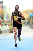 30 October 2016; Sergiu Ciobanu of Clonliffe Harriers A.C. approaches the finish line on his way to taking the men's Irish National Marathon Championship title during the SSE Airtricity Dublin Marathon 2016 at Merrion Square in Dublin City. 19,500 runners took to the Fitzwilliam Square start line today to participate in the 37th running of the SSE Airtricity Dublin Marathon, making it the fourth largest marathon in Europe. Photo by Stephen McCarthy/Sportsfile