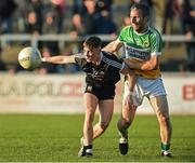 30 October 2016; Ceilum Doherty of Kilcoo in action against Eamon Ward of Glenswilly during the AIB Ulster GAA Football Senior Club Championship quarter-final game between Kilcoo and Glenswilly at Pairc Esler, Newry, Co. Down. Photo by Oliver McVeigh/Sportsfile