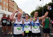 30 October 2016; West Waterford AC atheltes, from left, Vincent O'Donovan, Fiona Ormonde and Pat Frisby following the SSE Airtricity Dublin Marathon 2016 in Dublin City. 19,500 runners took to the Fitzwilliam Square start line to participate in the 37th running of the SSE Airtricity Dublin Marathon, making it the fourth largest marathon in Europe. Photo by Stephen McCarthy/Sportsfile