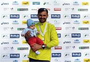 30 October 2016; Winner of the Irish Men's National Marathon Championship Sergie Ciobanu of Clonliffe Harriers AC, Dublin, with his son Daniel, aged 4 months, following the SSE Airtricity Dublin Marathon 2016 in Dublin City. 19,500 runners took to the Fitzwilliam Square start line to participate in the 37th running of the SSE Airtricity Dublin Marathon, making it the fourth largest marathon in Europe. Photo by Stephen McCarthy/Sportsfile