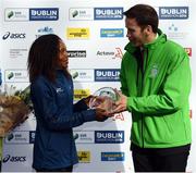 30 October 2016; Viola Jelagat Kibiwot of Kenya who finshed third with Ronan Brady, Head of Marketing, SSE Airtricity, following the SSE Airtricity Dublin Marathon 2016 in Dublin City. 19,500 runners took to the Fitzwilliam Square start line to participate in the 37th running of the SSE Airtricity Dublin Marathon, making it the fourth largest marathon in Europe. Photo by Stephen McCarthy/Sportsfile