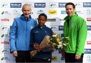 30 October 2016; Ehite Bizuayehu of Ethiopia who finished second with race director Jim Aughney, left, and Ronan Brady, Head of Marketing, SSE Airtricity, following the SSE Airtricity Dublin Marathon 2016 in Dublin City. 19,500 runners took to the Fitzwilliam Square start line to participate in the 37th running of the SSE Airtricity Dublin Marathon, making it the fourth largest marathon in Europe. Photo by Stephen McCarthy/Sportsfile