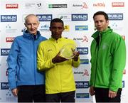 30 October 2016; Third place Asafa Legese Bekele of Ethiopa with race director Jim Aughney, left, and Ronan Brady, Head of Marketing, SSE Airtricity, following the SSE Airtricity Dublin Marathon 2016 in Dublin City. 19,500 runners took to the Fitzwilliam Square start line to participate in the 37th running of the SSE Airtricity Dublin Marathon, making it the fourth largest marathon in Europe. Photo by Stephen McCarthy/Sportsfile