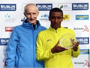 30 October 2016; Third place Asafa Legese Bekele of Ethiopa with race director Jim Aughney following the SSE Airtricity Dublin Marathon 2016 in Dublin City. 19,500 runners took to the Fitzwilliam Square start line to participate in the 37th running of the SSE Airtricity Dublin Marathon, making it the fourth largest marathon in Europe. Photo by Stephen McCarthy/Sportsfile