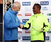 30 October 2016; Race winner Dereje Debele Tulu of Ethiopia with race director Jim Aughney following the SSE Airtricity Dublin Marathon 2016 in Dublin City. 19,500 runners took to the Fitzwilliam Square start line to participate in the 37th running of the SSE Airtricity Dublin Marathon, making it the fourth largest marathon in Europe. Photo by Stephen McCarthy/Sportsfile