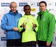 30 October 2016; Race winner Dereje Debele Tulu of Ethiopia with race director Jim Aughney, left, and Ronan Brady, Head of Marketing, SSE Airtricity, following the SSE Airtricity Dublin Marathon 2016 in Dublin City. 19,500 runners took to the Fitzwilliam Square start line to participate in the 37th running of the SSE Airtricity Dublin Marathon, making it the fourth largest marathon in Europe. Photo by Stephen McCarthy/Sportsfile