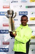 30 October 2016; Race winner Dereje Debele Tulu of Ethiopia with the Noel Carroll Memorial trophy following the SSE Airtricity Dublin Marathon 2016 in Dublin City. 19,500 runners took to the Fitzwilliam Square start line to participate in the 37th running of the SSE Airtricity Dublin Marathon, making it the fourth largest marathon in Europe. Photo by Stephen McCarthy/Sportsfile
