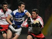 19 March 2011; Dermot Carlin, Tyrone, in action against John O'Loughlin, Laois. Allianz Football League Division 2 Round 5, Laois v Tyrone, O'Moore Park, Portlaoise, Co. Laois. Picture credit: Ray McManus / SPORTSFILE