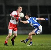 19 March 2011; Kevin Hughes, Tyrone, in action against Colm Begley, Laois. Allianz Football League Division 2 Round 5, Laois v Tyrone, O'Moore Park, Portlaoise, Co. Laois. Picture credit: Ray McManus / SPORTSFILE