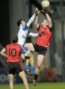 19 March 2011; Peter Fitzpatrick, Down, in action against Neil McAdam, Monaghan. Allianz Football League Division 1 Round 5, Down v Monaghan, Pairc Esler, Newry, Co. Down. Photo by Sportsfile