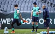 4 November 2016; Jonathan Sexton, centre, of Ireland watches team-mate Joey Carbery practice his kicking during their team captain's run at Soldier Field in Chicago, USA. Photo by Brendan Moran/Sportsfile