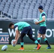 4 November 2016; Jonathan Sexton, right, of Ireland watches team-mate Joey Carbery practice his kicking during their team captain's run at Soldier Field in Chicago, USA. Photo by Brendan Moran/Sportsfile