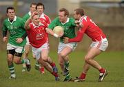 20 March 2011; Steven Kelly, Limerick, in action against Stephen Fitzpatrick, left, and Paddy Keenan, Louth. Allianz Football League Division 3 Round 5, Louth v Limerick, County Grounds, Drogheda, Co. Louth. Photo by Sportsfile