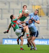 20 March 2011; Denis Bastick, 8, and Paul Casey, Dublin, challenge Tom Parsons, left, and Ronan McGarrity, Mayo. Allianz Football League Division 1 Round 5, Dublin v Mayo, Croke Park, Dublin. Picture credit: Dáire Brennan / SPORTSFILE