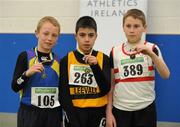 19 March 2011; Competitors, from left to right, Jack Waters, Roundwood and District, 2nd place, Robert Cregan, Leevale, 1st place, and Bradley Nealon, Ballina, 3rd place, with their medals after the U12 Boys 60m. Woodie’s DIY National Juvenile Indoor Championships, Meadowbank Indoor Arena, Magherafelt, Derry. Picture credit: Oliver McVeigh / SPORTSFILE