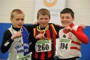 19 March 2011; Competitors from left to right, Christopher Whittle, Tullamore Harriers, 2nd place, David Ryan, Moycarkey Coolcroo, 1st place, and Eoin Hallinan, Ballina, 3rd place, with their medals after the U12 Boys long jump. Woodie’s DIY National Juvenile Indoor Championships, Meadowbank Indoor Arena, Magherafelt, Derry. Picture credit: Oliver McVeigh / SPORTSFILE