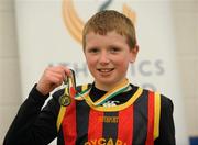 19 March 2011; David Ryan, Moycarkey Coolcroo, with his medal after winning the U12 Boys long jump. Woodie’s DIY National Juvenile Indoor Championships, Meadowbank Indoor Arena, Magherafelt, Derry. Picture credit: Oliver McVeigh / SPORTSFILE