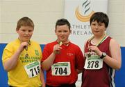 19 March 2011; Competitors, from left to right, Oisin Murphy, Glaslough Harriers, 2nd place, Thomas McGowan, Tir Chonaill, 1st place, and Ciaran O'Maoileoin, An Ghaeltacht, 3rd place, with their medals after the U13 Boys Shot Putt. Woodie’s DIY National Juvenile Indoor Championships, Meadowbank Indoor Arena, Magherafelt, Derry. Picture credit: Oliver McVeigh / SPORTSFILE
