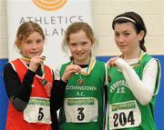 19 March 2011; Competitors, from left to right, Kate O'Connor, St Gerards, 2nd place, Zoe Mohin, Cushinstown, 1st place, and Chloe Farrell , Ferrybank, 3rd place, with their medals after the U12 Girls Long Jump. Woodie’s DIY National Juvenile Indoor Championships, Meadowbank Indoor Arena, Magherafelt, Derry. Picture credit: Oliver McVeigh / SPORTSFILE